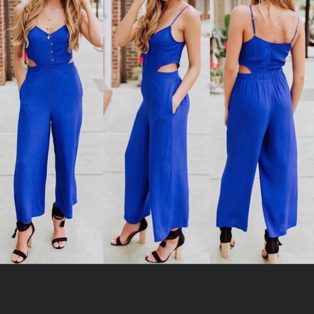 Blue jumpsuit with cut outs on side